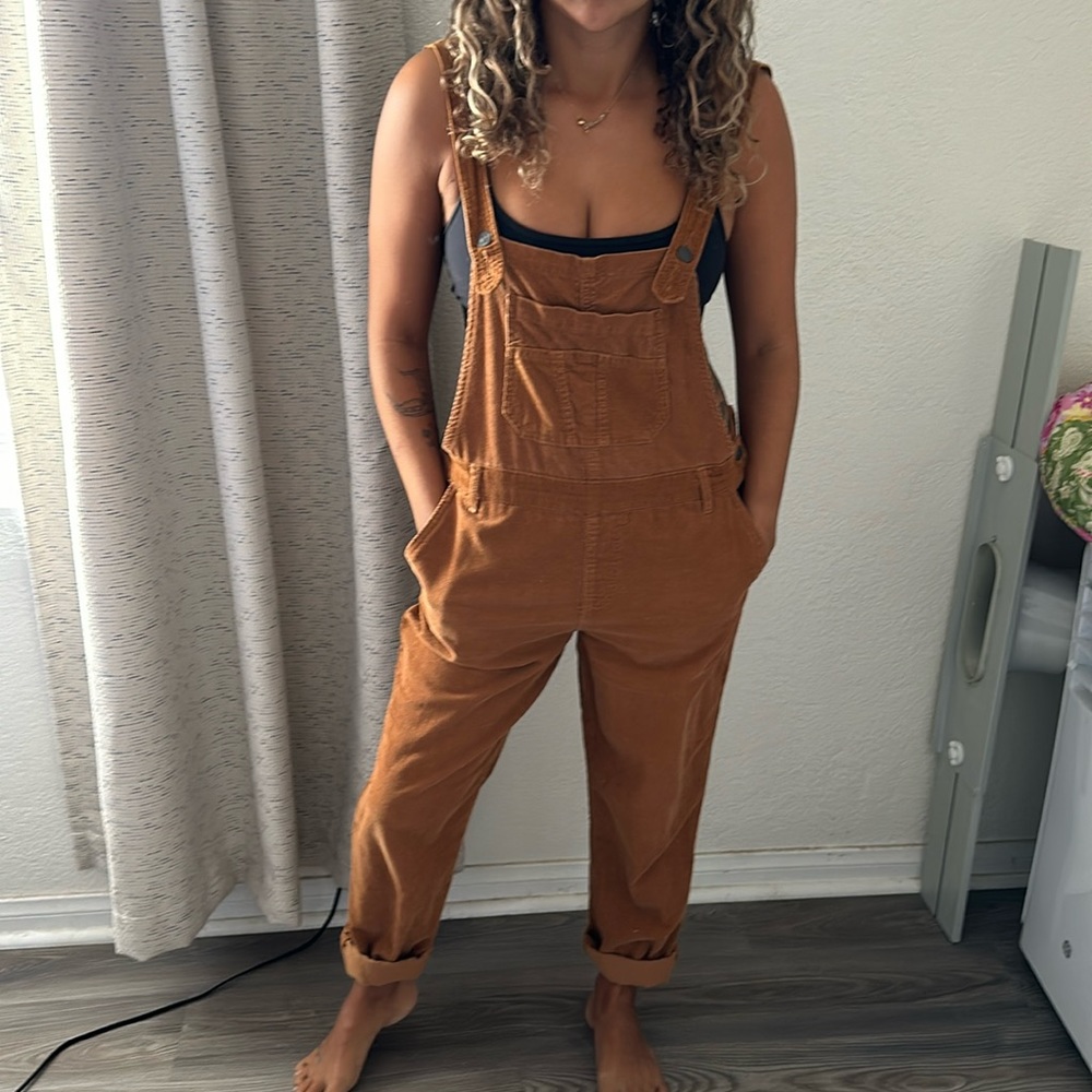 Corduroy overalls loose to tight fit with side buttons and adjustable straps